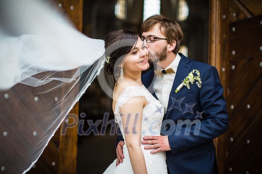 Portrait of a young wedding couple on their wedding day