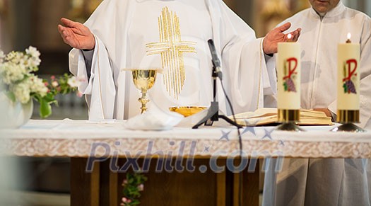 Priest during a wedding ceremony/nuptial mass