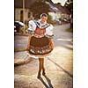 Keeping tradition alive: young woman in a richly decorated ceremonial folk dress/regional costume (Kyjov folk costume, Southern Moravia, Czech Republic)