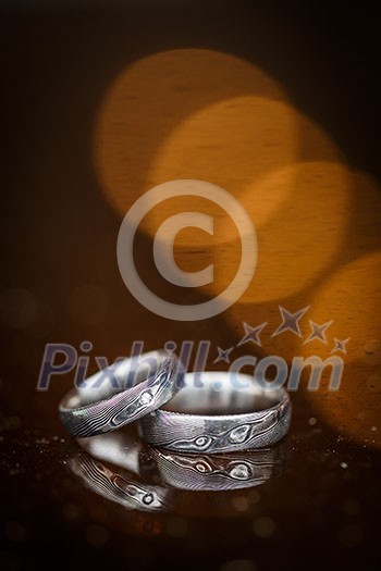Two splendid wedding rings on a wedding day. Two splendid wedding rings on a wedding day.