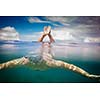 Young male snorkeler divingin the sea