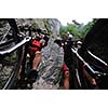 two friends have fun outdoor in nature and representing concept of  healthy life and fitnes on muntain bike 