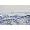 winter mountain landscape at sunny day and snow peaks