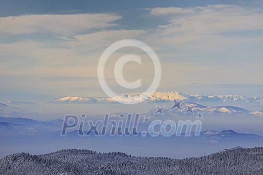 winter mountain landscape at sunny day and snow peaks