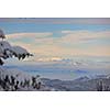 winter mountain landscape at sunny day and snow peaks