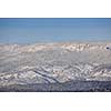 winter mountain landscape at sunny day and snow peaks