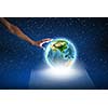 Close up of human hand holding Earth planet. Elements of this image are furnished by NASA