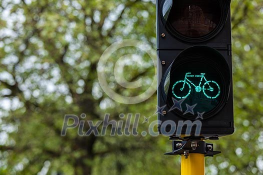 Bicycle ecological transport concept background - Bicycle traffic light in Europe. Brugge, Belgium
