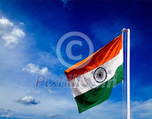 India indian flag in blue sky - copyspace India indian flag in blue sky - copyspace
