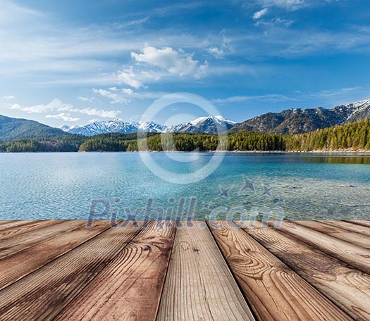 Wooden planks European nature background with lake in Alps, Germany Wooden planks European nature background with lake in Alps, Germany