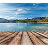 Wooden planks European nature background with lake in Alps, Germany