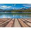 Wooden planks background with lake in Alps, Bavaria, Germany