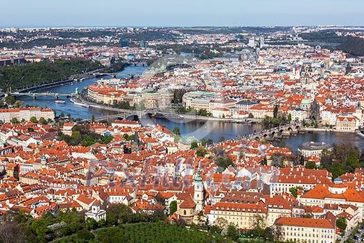 Aerial view of Charles Bridge over Vltava river and Old city from Petrin hill Observation Tower. Prague, Czech Republic