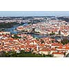 Aerial view of Charles Bridge over Vltava river and Old city from Petrin hill Observation Tower. Prague, Czech Republic