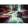 Vintage retro effect filtered hipster style image of tropical waterfall. Popokvil Waterfall, Bokor National Park, Cambodia
