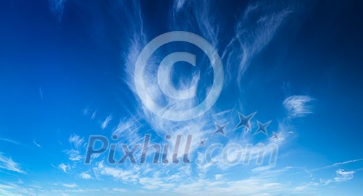 Blue sky with white cirrus clouds