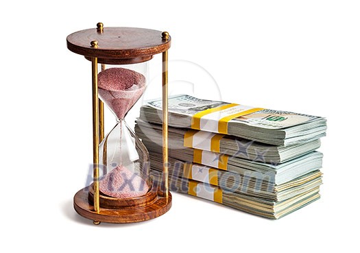Time is money loan concept background - hourglass and stack of new 100 US dollars 2013 edition banknotes bills bundles isolated on white