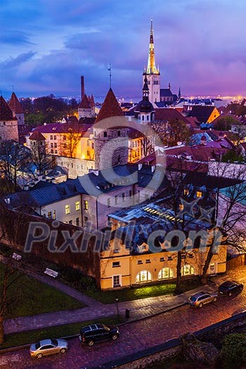 Aerial view of Tallinn Medieval Old Town illuminated in evening, Estonia Aerial view of Tallinn Medieval Old Town illuminated in evening, Estonia