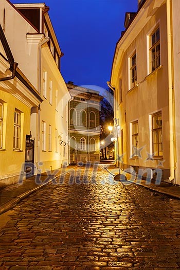 Tallinn Old Town street with cobblestones in night, Estonia Tallinn Old Town street with cobblestones in night, Estonia