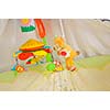 baby bed with colorful toys indoor