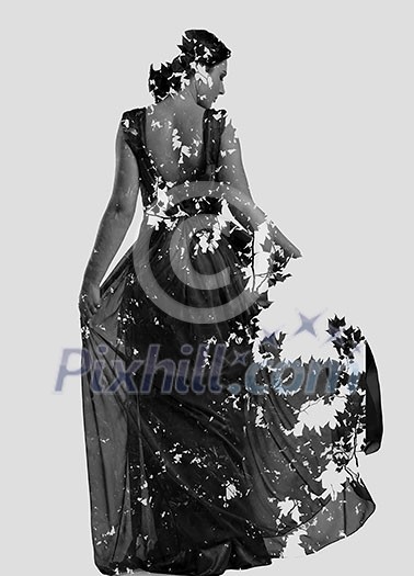 double exposure of woman in fashion dress with nature tree branches background