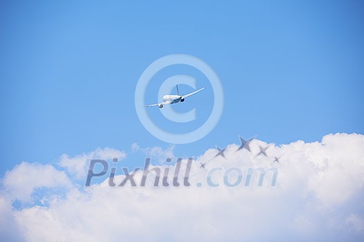 modern airplane travel, clear blue sky in background modern airplane travel, clear blue sky in background