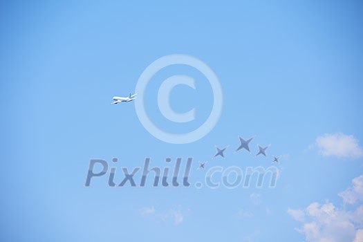 modern airplane travel, clear blue sky in background modern airplane travel, clear blue sky in background