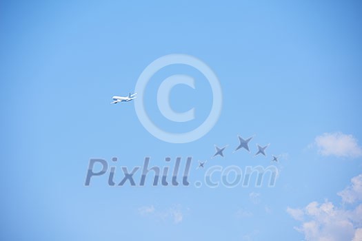 modern airplane travel,  clear blue sky in background