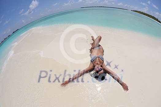 beautiful and happy young woman on beach have fun and relax on summer vacation over the crystal clear sea beautiful and happy young woman on beach have fun and relax on summer vacation over the crystal clear sea