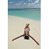 beautiful and happy young woman on beach have fun and relax on summer vacation  over the crystal clear sea