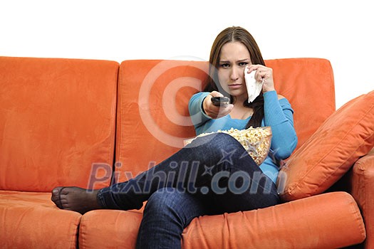 young woman eat popcorn, watching movies and eat popcorn at modern home living room isolated on white background young woman eat popcorn, watching movies and eat popcorn at modern home living room isolated on white background