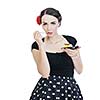 beautiful young retro pinup  woman eat sweet cake food isolated on white iin studio, representing diet and healthy concept