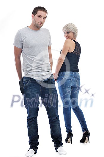 young couple isolated on white in fashionable underwear and blue jeans clothing