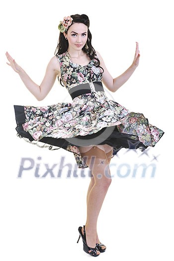 beautiful young woman isolated on white in studio in old fashion clothes representing pinup and retro style