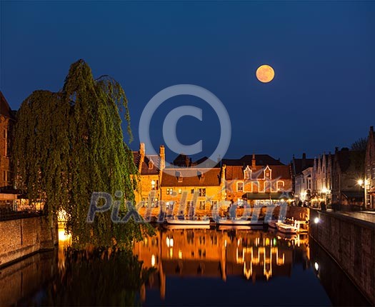 Canal and medieval houses in twilight. Bruges (Brugge), Belgium Canal and medieval houses in twilight. Bruges (Brugge), Belgium