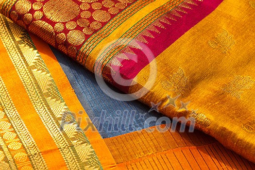 Indian silk saries close up. Background Indian silk saries close up. Background