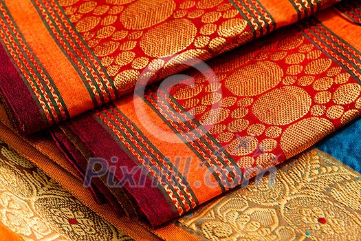 Indian silk saries close up. Background Indian silk saries close up. Background