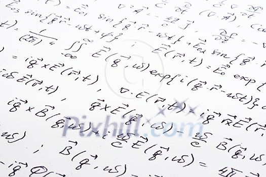 Physical equations (electromagnetics) hand written on paper Physical equations (electromagnetics) hand written on paper