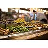 Olives on sale/display in a food market/grocery store