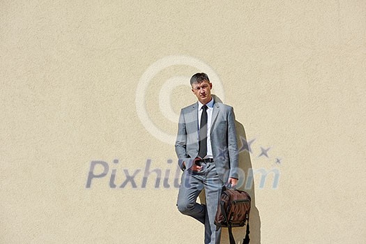 urban outdoor portrait of middle aged senior business man urban outdoor portrait of middle aged senior business man