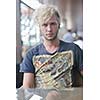 Portrait of an handsome young  man  with urban background and fashion clothes style