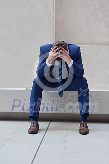 frustrated young business man working on laptop computer at office