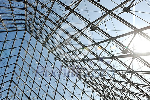 Metal roof top structure with glass construction background from Museum  du Louvre in paris france