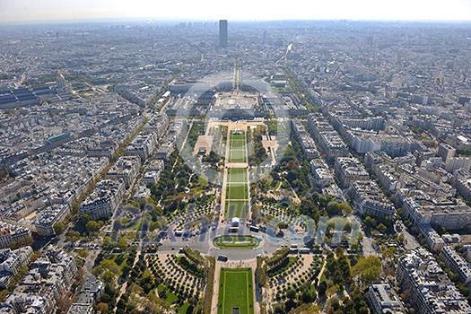 Eiffel Tower in Paris against a dramatic blue sky at day tourist and travel attraction