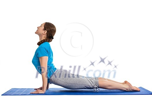 Yoga - young beautiful woman yoga instructor doing Upward Facing Dog Pose (Back Bend) (Urdhva Mukha Svanasana) asana exercise isolated on white background Yoga - young beautiful woman yoga instructor doing Upward Facing Dog Pose (Back Bend) (Urdhva Mukha Svanasana) asana exercise isolated on white background