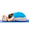 Yoga - young beautiful slender woman yoga instructor doing Seated Forward Bend or Intense Dorsal Stretch pose asana (Paschimottanasana) exercise isolated on white background