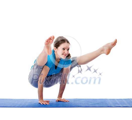 Yoga - young beautiful woman yoga instructor doing Firefly asana pose (Titibasana) exercise isolated on white background Yoga - young beautiful woman yoga instructor doing Firefly asana pose (Titibasana) exercise isolated on white background