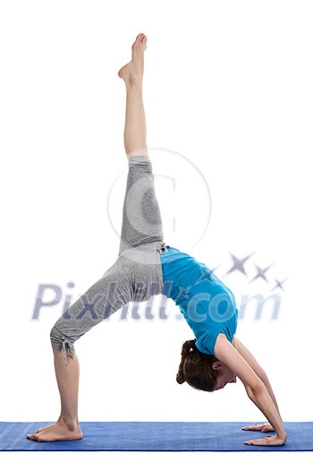 Yoga - young beautiful woman yoga instructor doing Wheel Pose with one leg lifted straight up (Eka Pada Chakrasana) exercise isolated on white background Yoga - young beautiful woman yoga instructor doing Wheel Pose with one leg lifted straight up (Eka Pada Chakrasana) exercise isolated on white background