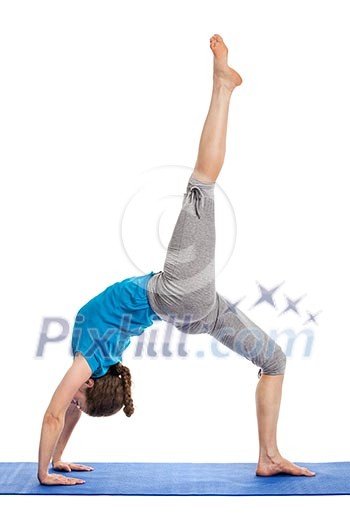 Yoga - young beautiful slender woman yoga instructor doing One-legged Upward Bow Pose (ekapada urdhva dhanurasana) asana exercise isolated on white background Yoga - young beautiful slender woman yoga instructor doing One-legged Upward Bow Pose (ekapada urdhva dhanurasana) asana exercise isolated on white background