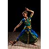 Young beautiful woman dancer exponent of Indian classical dance Bharatanatyam